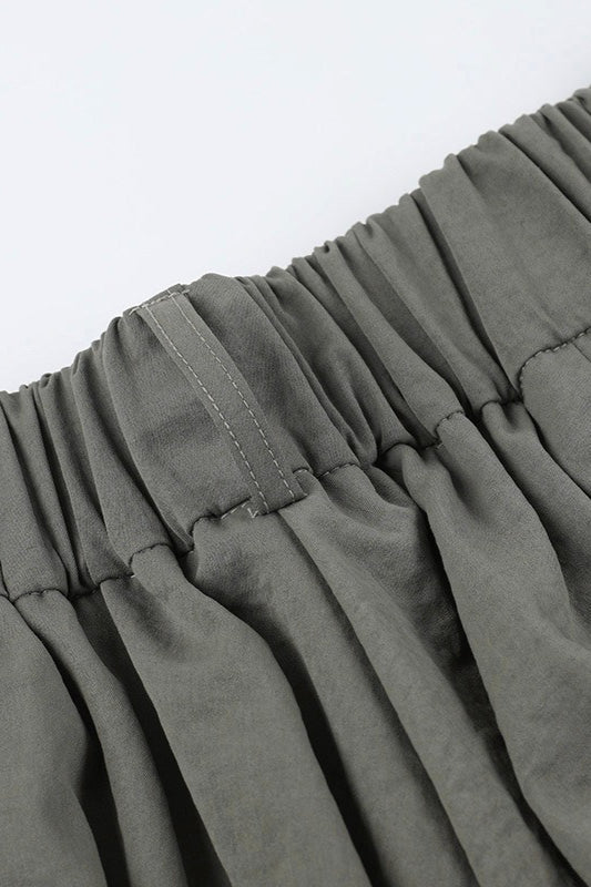 Low-Rise Pleated Denim Mini Skort